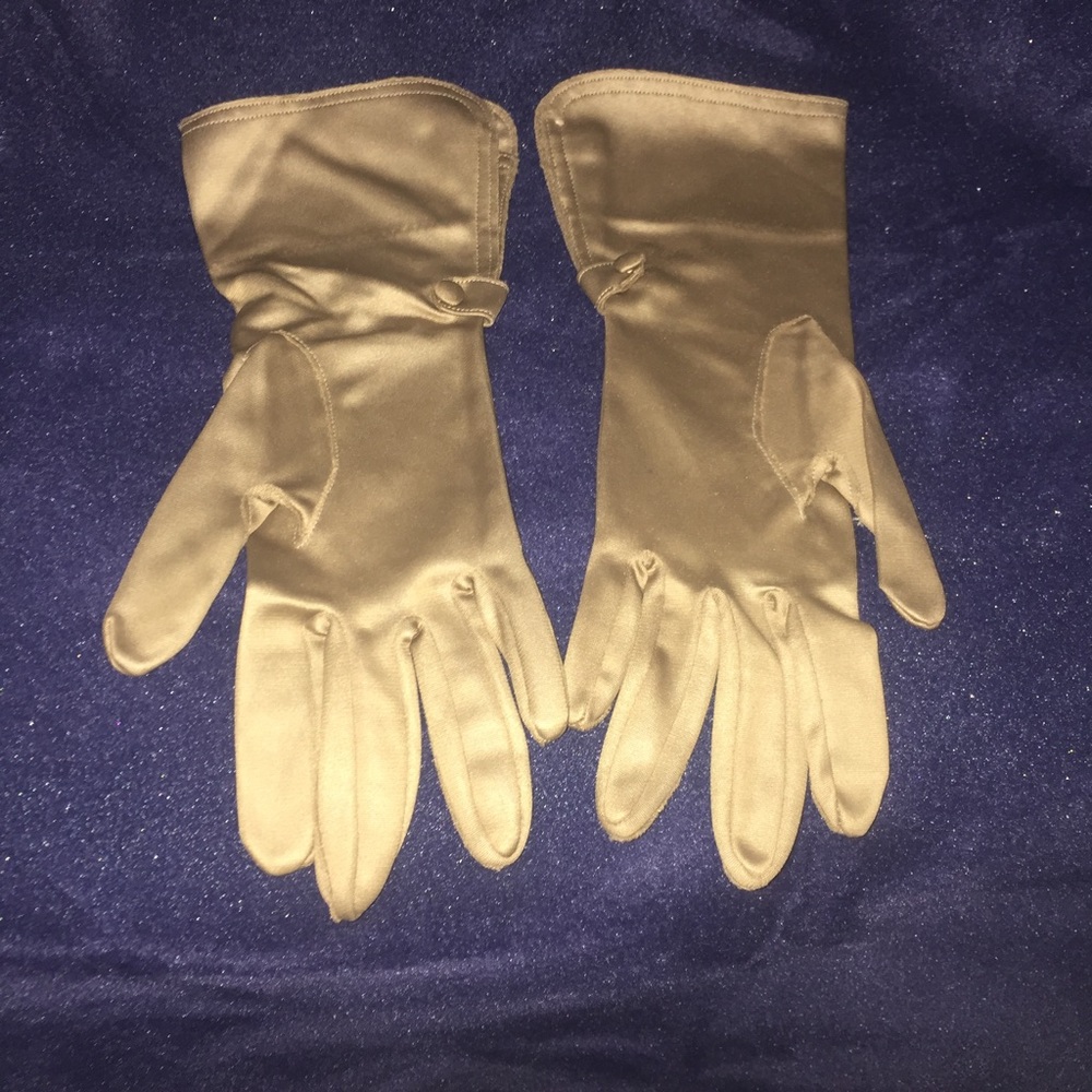 Antique ladies gloves with button details.